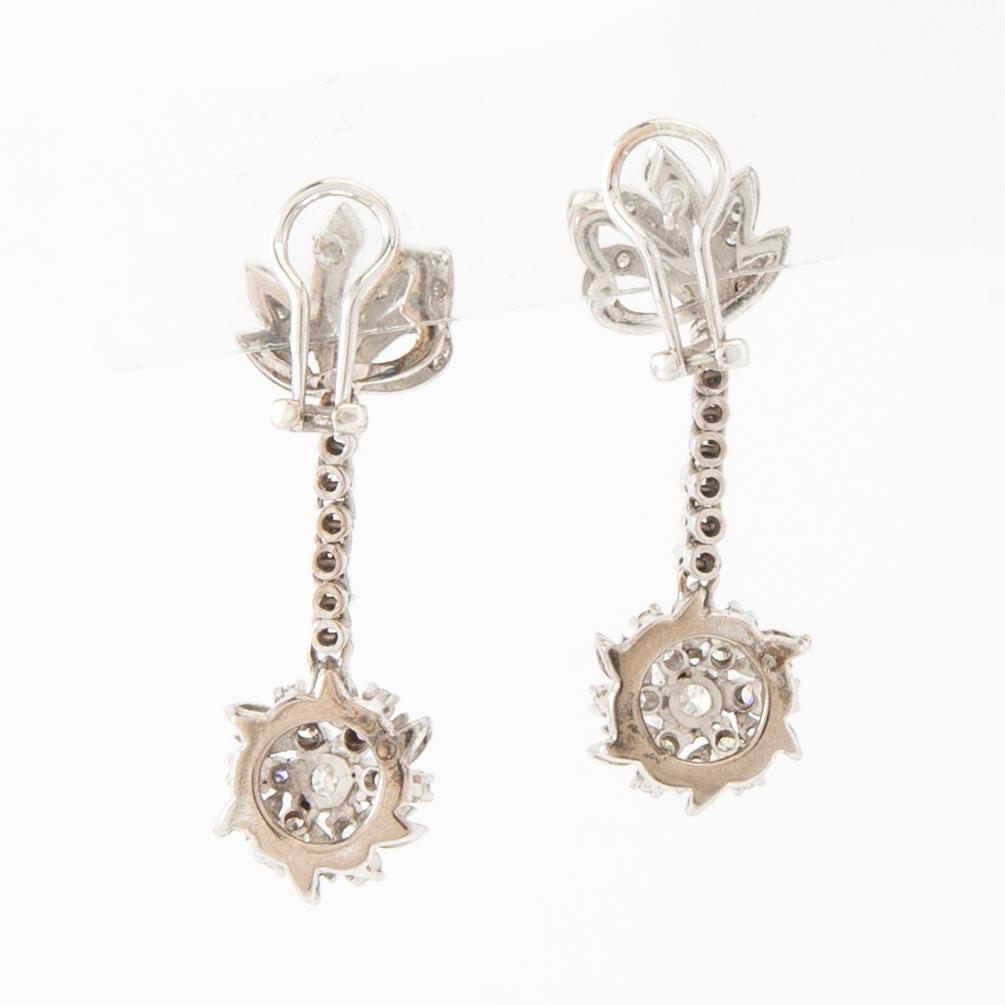 Earrings, a pair of 8K white gold with round brilliant-cut and single-cut diamonds.