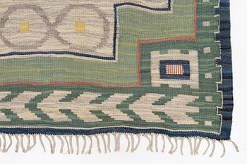 A carpet, flat weave, c. 340 x 246 cm, signed JBV (Johanna Brunssons Vävskola).