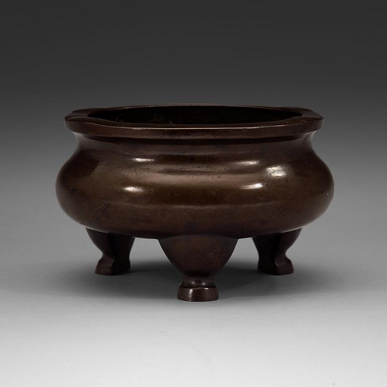 A bronze tripod censer, Ming dynasty (1368-1644).