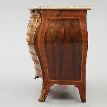 A rococo ormolu-mounted and parquetry commode attributed to C. G. Willkom (master in Stockholm 1763-65).