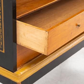 A North-European painted neoclassical cabinet, early 19th century.
