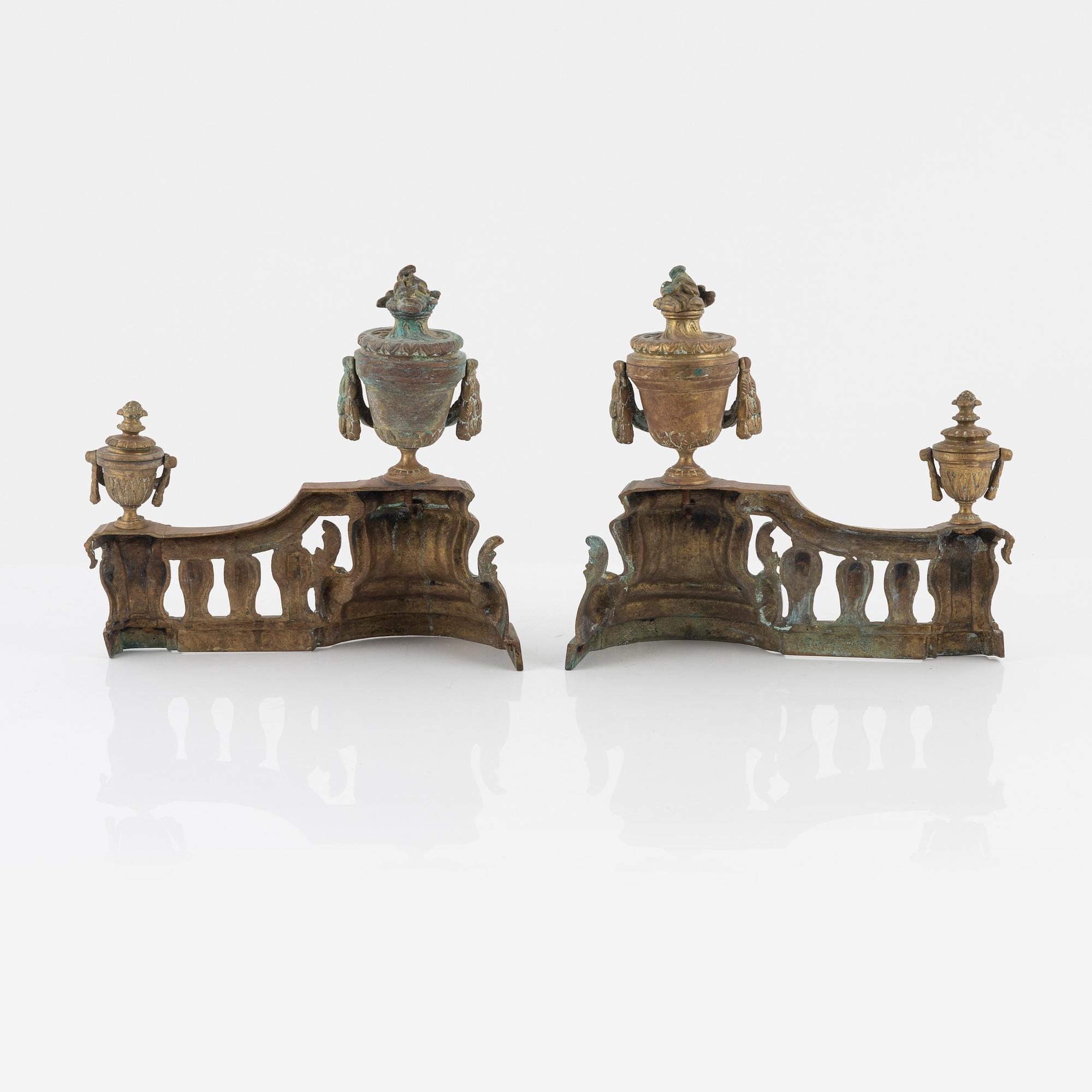 A Louis XVI style bronze grate, 19th Century.