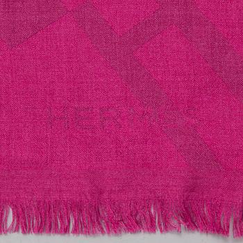 A cashmere and silk shawl by Hermès.