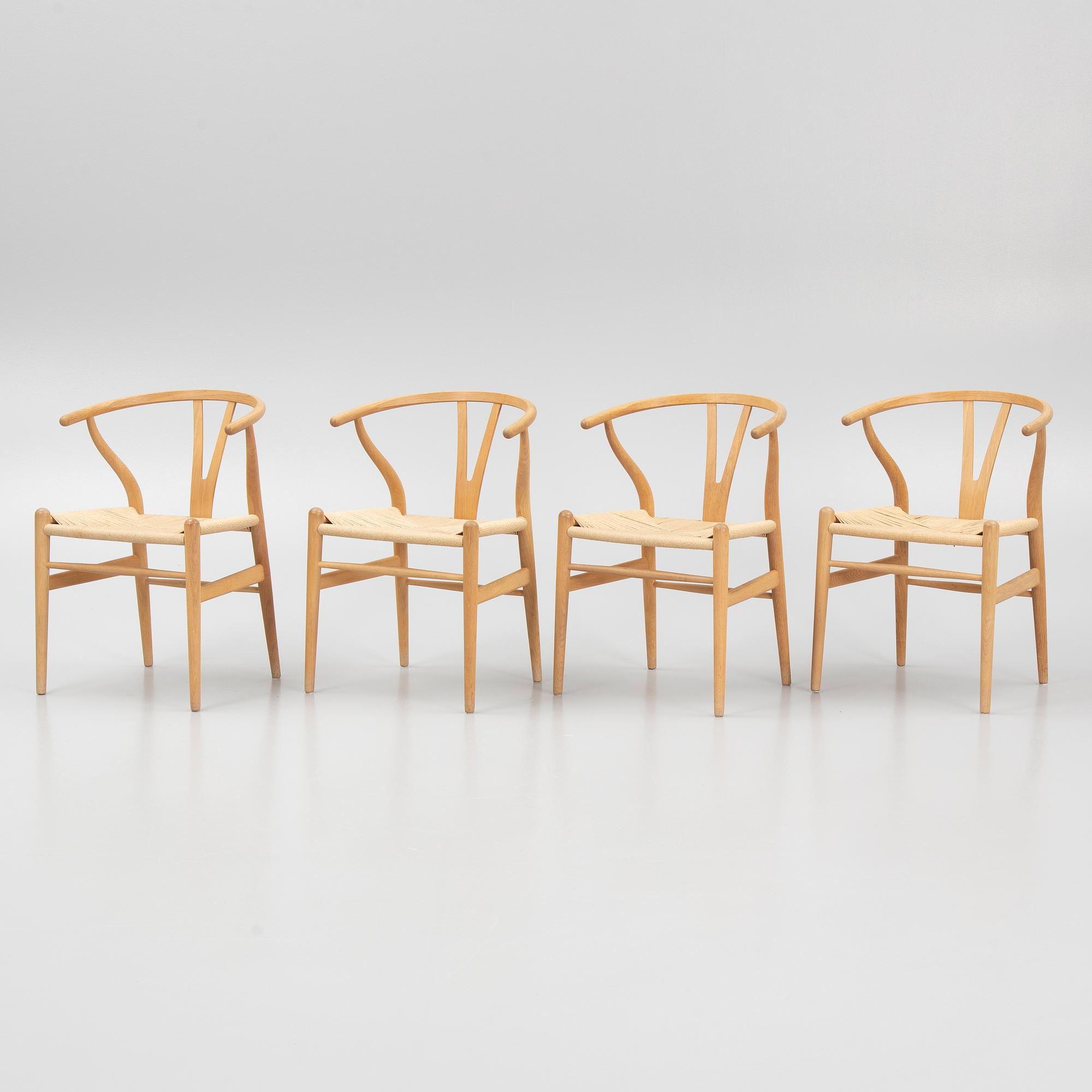 Hans J. Wegner, a set of four model 'CH-24' chairs, Carl Hansen & Søn, Denmark.