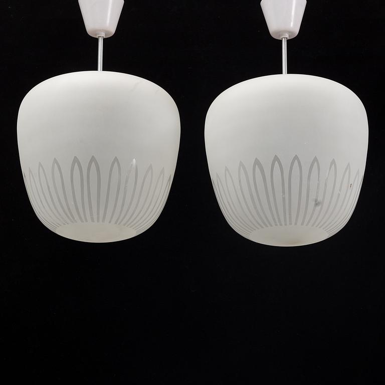 A pair of 1940's Swedish medern ceiling lamps.