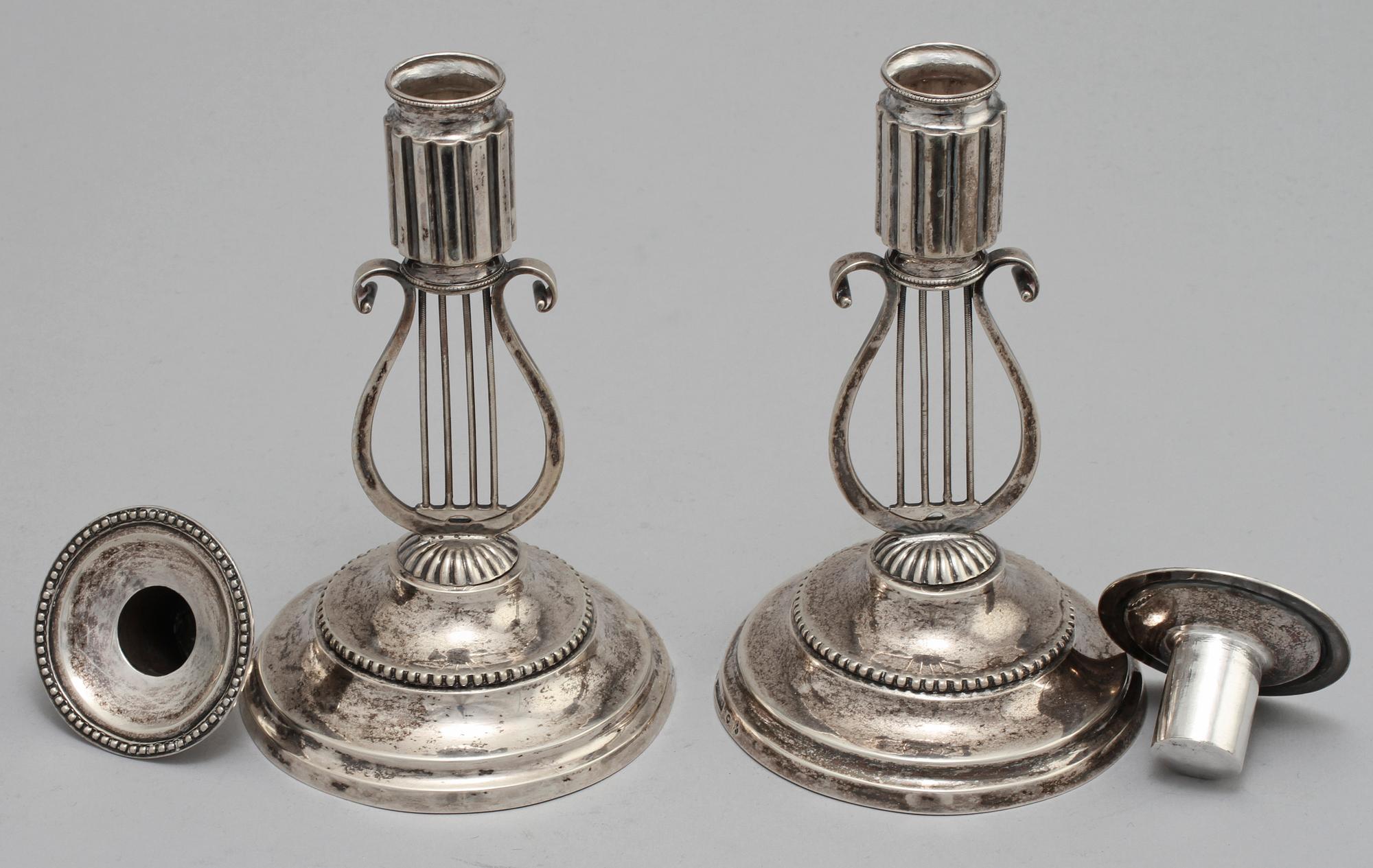 LJUSSTAKAR, ett par, silver, empire, Carl Fredrik Lilja, Karlskrona, 1820.