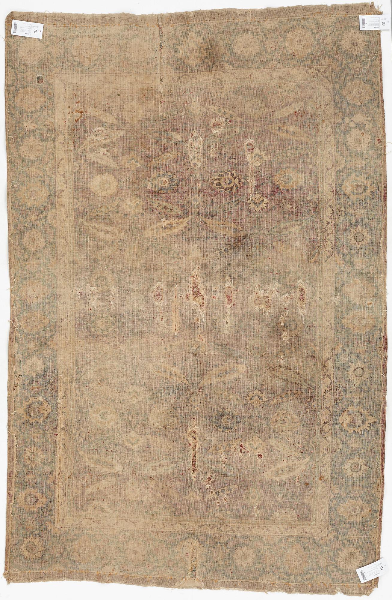 MATTO, A MUGHAL RUG, an antique Indian, the second half of the 17th century, ca 191-198,5 x 126,5-127,5 cm.