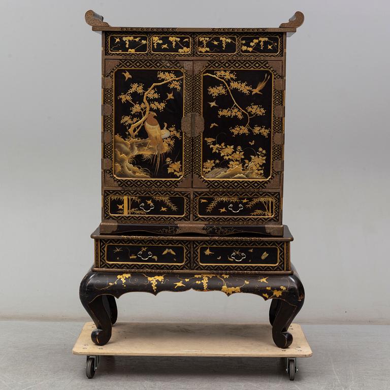 A Japanese lacquer work cabinet, early 20th Century.