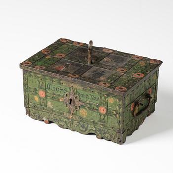 A Baroque South German engraved and polychrome-painted iron and steel strongbox, later part of the 17th century.