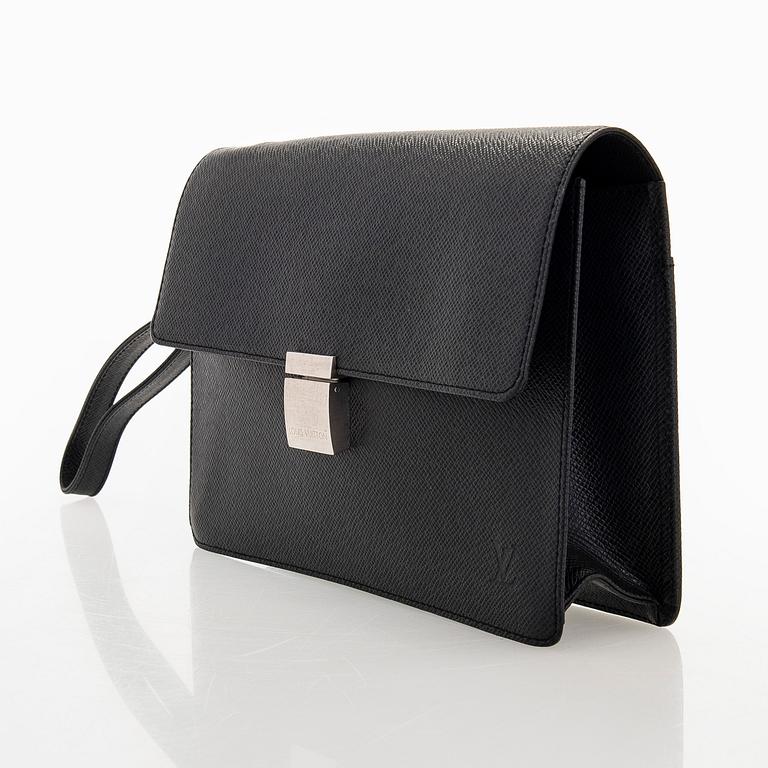 Louis Vuitton, a 'Selenga' clutch bag.