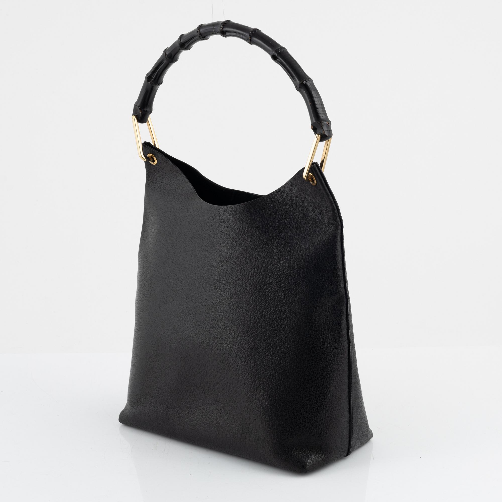Gucci, a black leather 'Bamboo' bag.