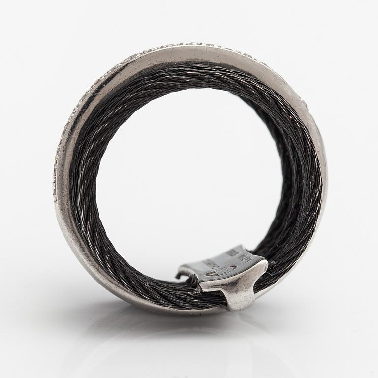 An 18K white gold and steel ring with diamonds ca. 0.095 ct in total. Charriol.