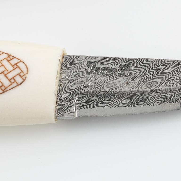 A reindeer horn knife by Bertil Fällman, signed.