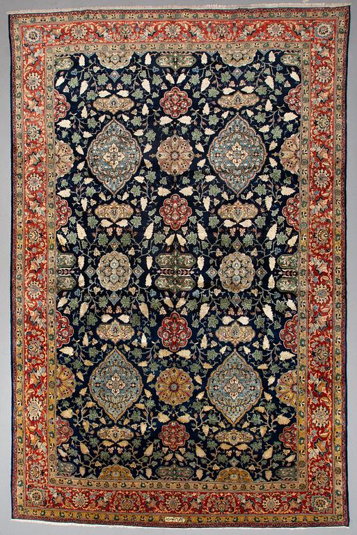 A CARPET so called Royal Kashan, part silk, signed, ca 483 x 311 cm.