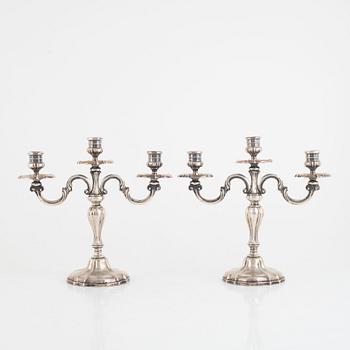 A Pair of Silver Candelabras, Swedish import mark K Anderson, Stockholm 1929.