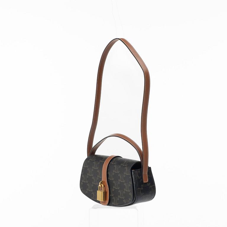 Céline, Bag "Tabou Clutch on Strap".