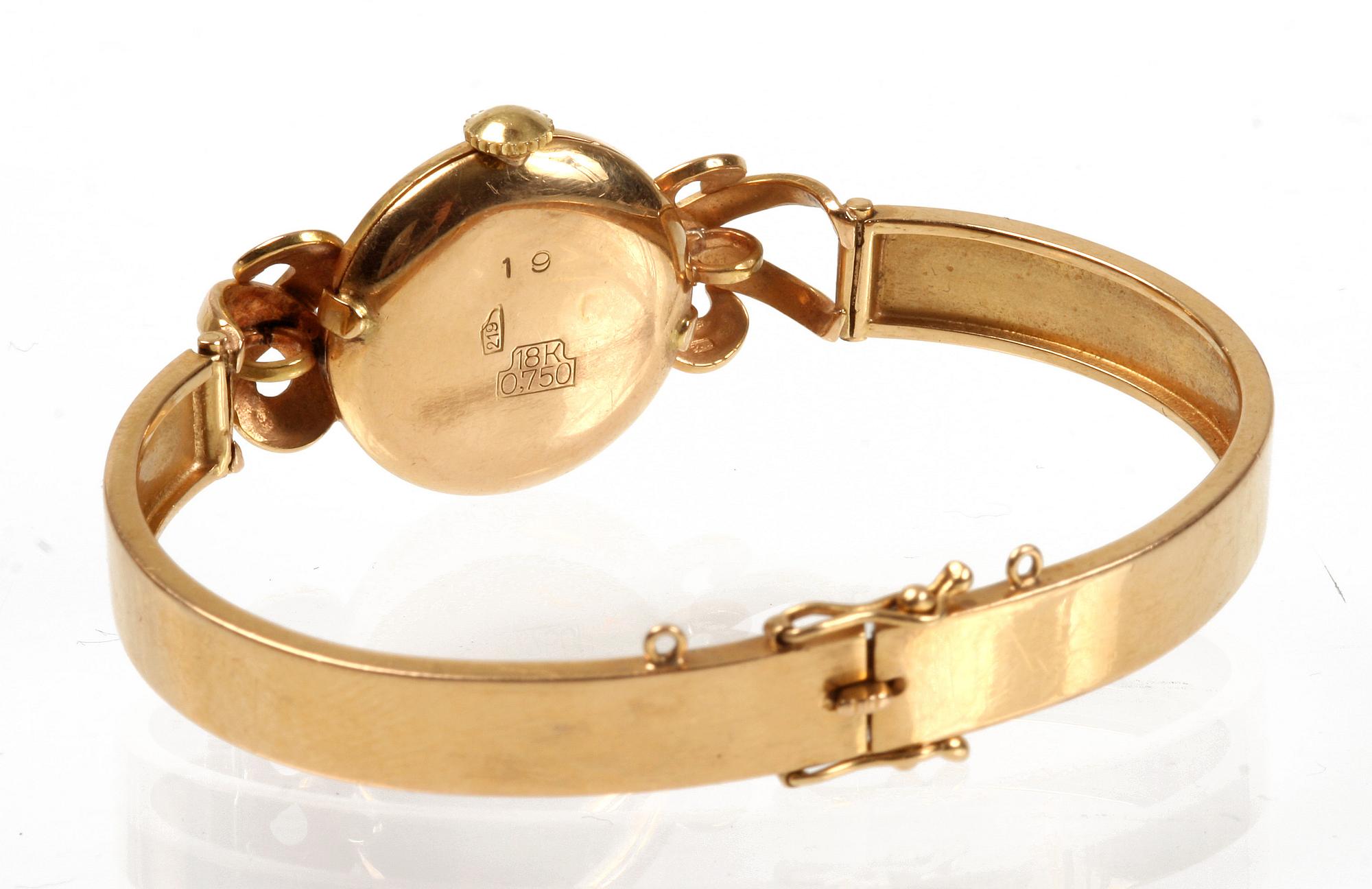 DAMARMBANDSUR, 18 K guld, 1900-tal. Tot vikt 25 gr.