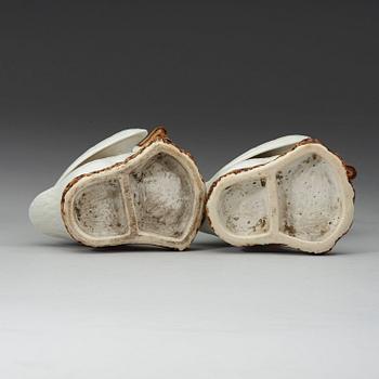 A pair white glazed ducks, early 20th century.