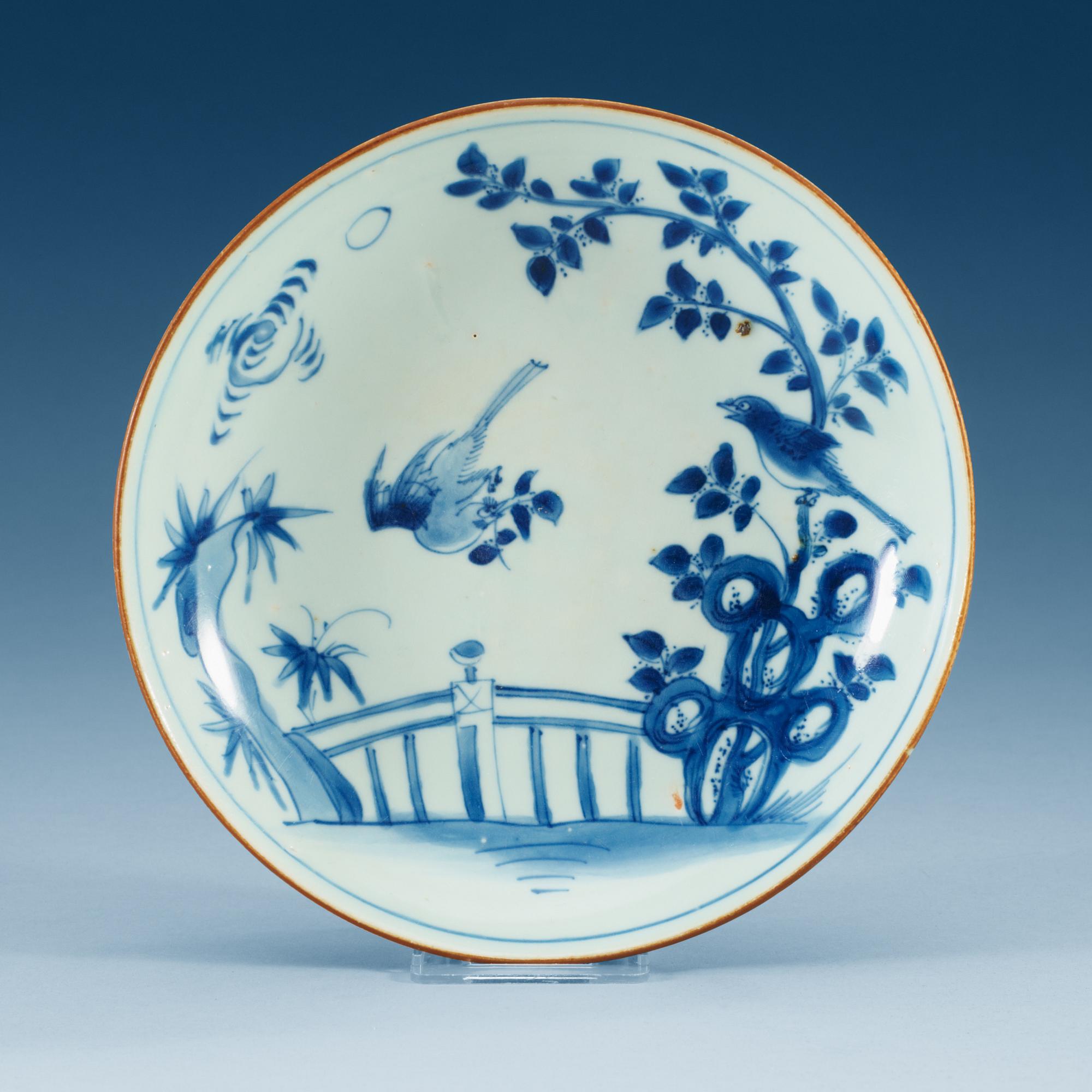A Transitional blue and white dish, 17th Century, with hallmark.