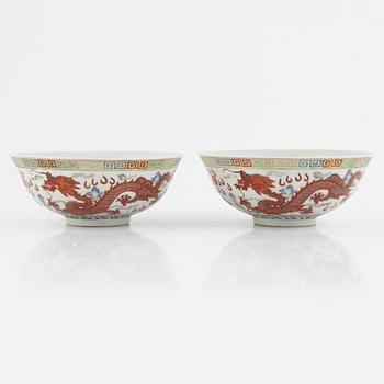 A pair of dragon and phoenix bowls, China, Republic with Qianlong mark.