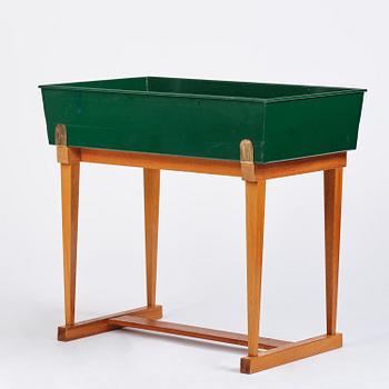Josef Frank, a rare flower table with green lacquered box model B 2084, Firma Svenskt Tenn, 1950-60s.