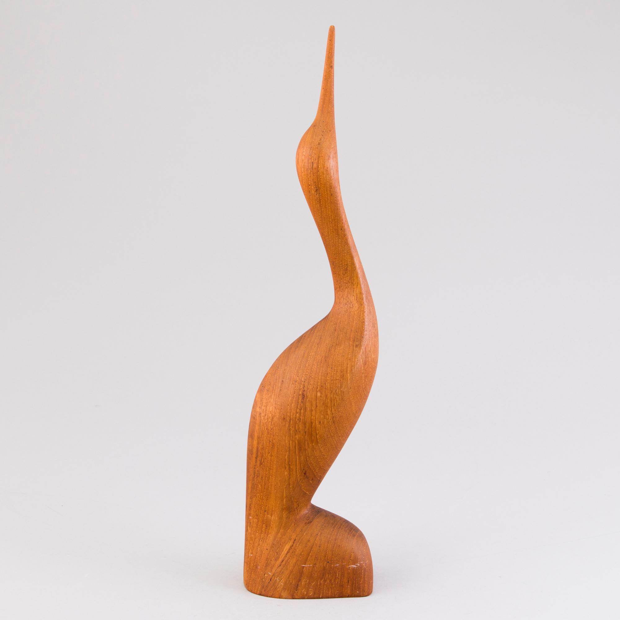 SAKARI PYKÄLÄ, a wooden sculpture, signed and dated -65.