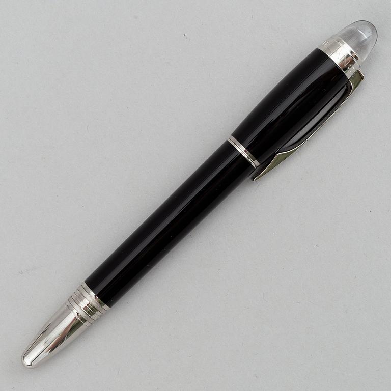 MOntblanc, a ball point pen and leather passport holder.