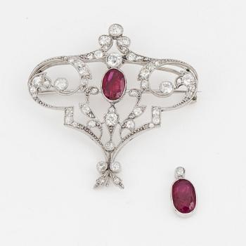 An old-cut diamond and ruby brooch.