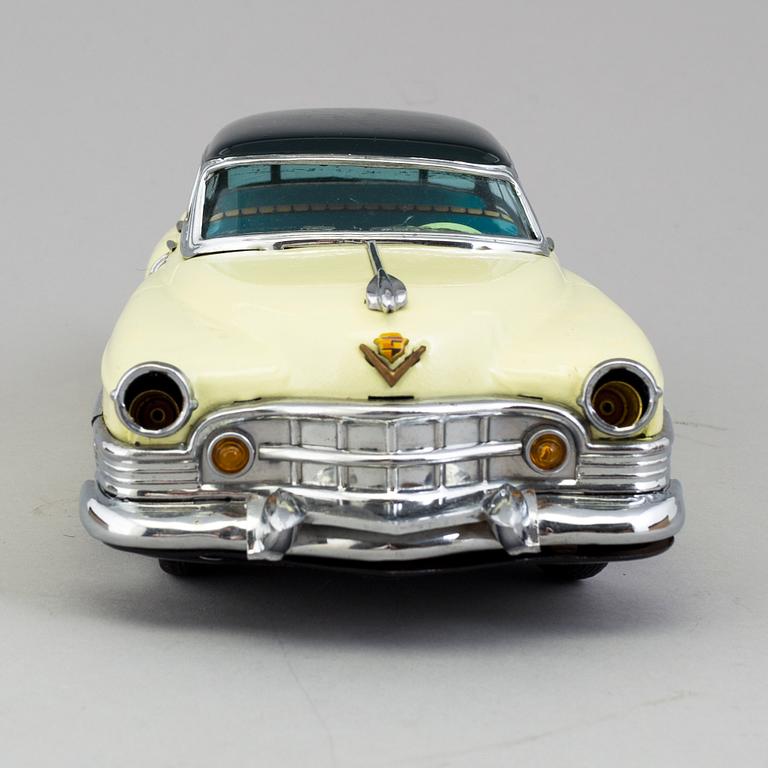 A tinplate Marusan Cadillac, Japan, ca 1951.