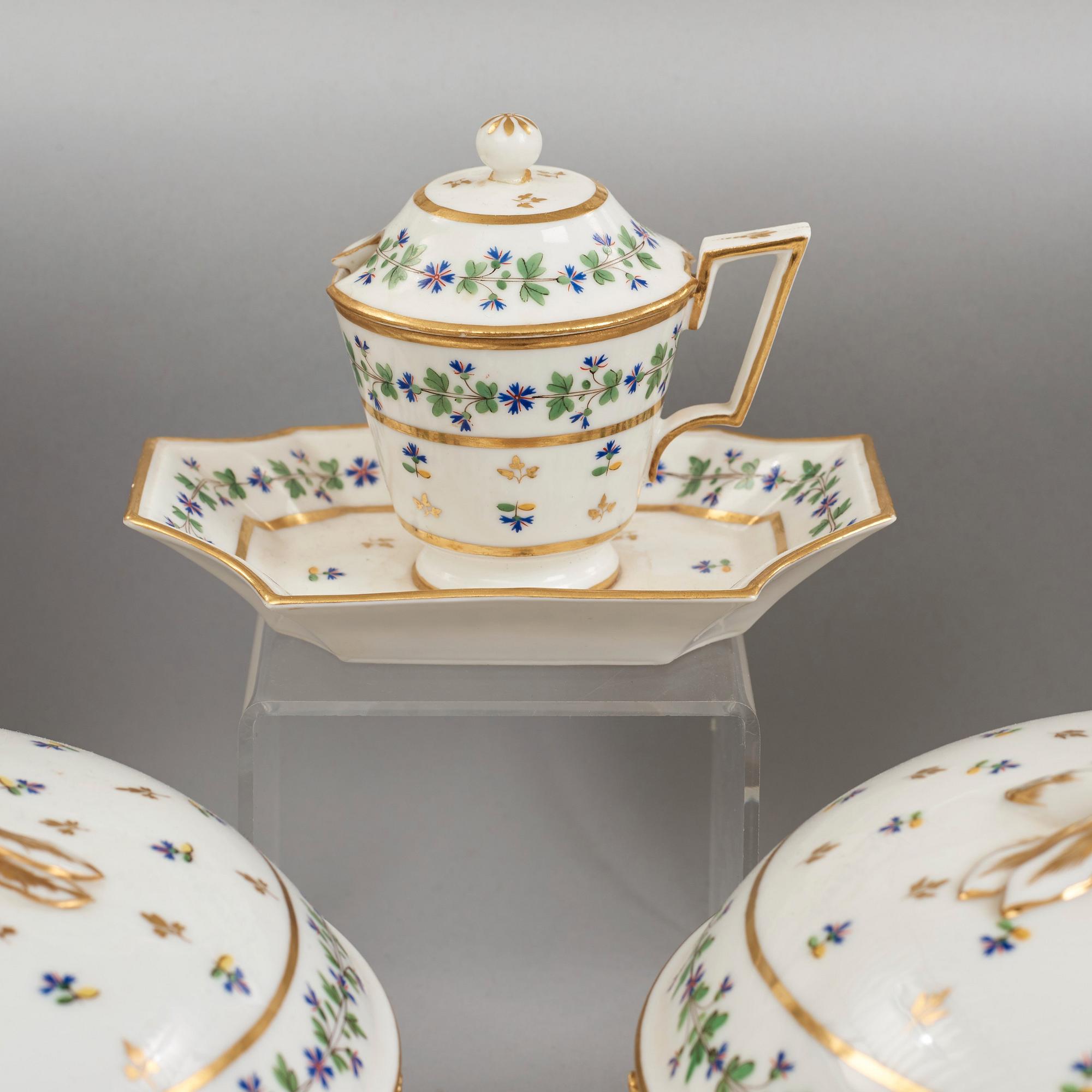 A French dinner service, circa 1800, some pieces marked M F Guerhard & Dahl.  (70 pieces).
