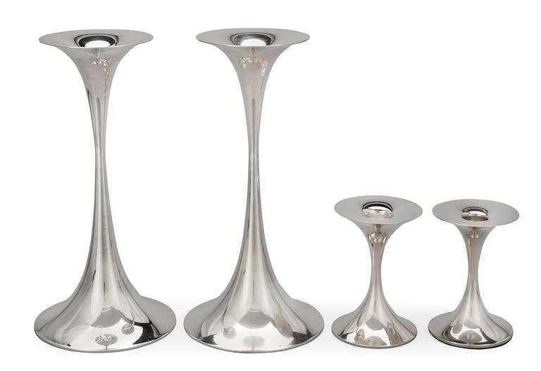 Tapio Wirkkala, A SET OF FOUR CANDLESTICKS.