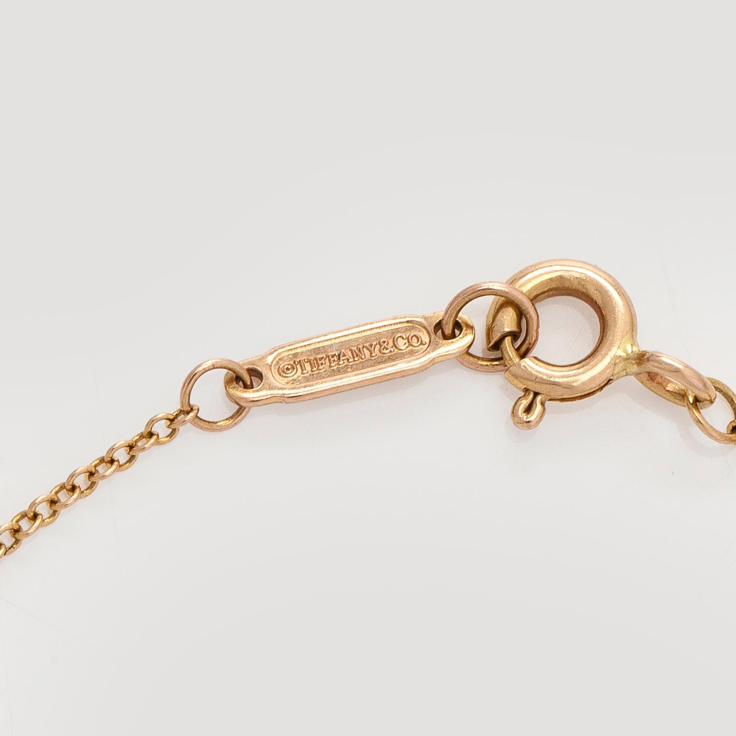 Tiffany & Co, an 18K gold 'Infinity Endless' bracelet.