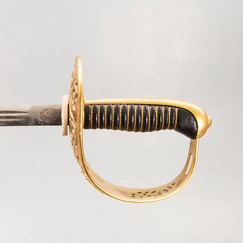 A cavalry officer's sword, 1893 pattern, with scabbard.