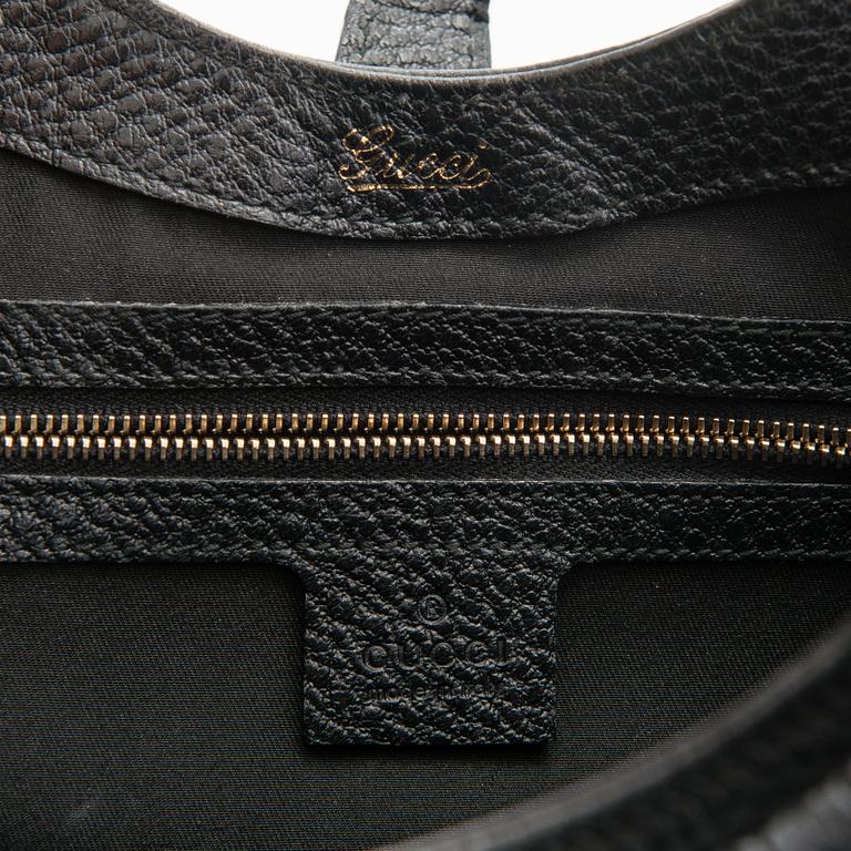 Gucci, A black leather 'Bardot' handbag.