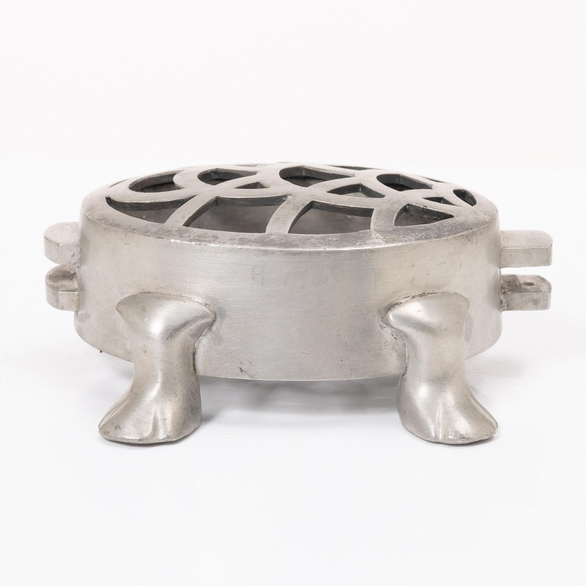 Firma Svenskt Tenn, a pewter flowerstand in the shape of a tortoise,  model no. A 1081, probably 1930s.