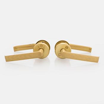 A set of eight 1960s-70s door handles.