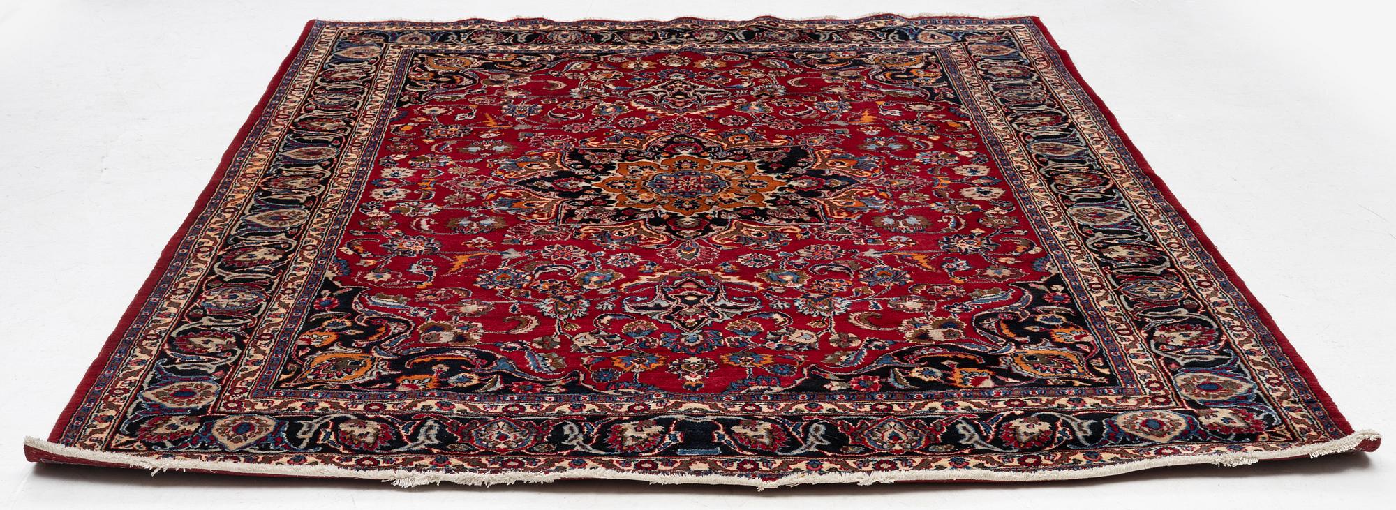 A carpet, Oriental, c. 335 x 257 cm.