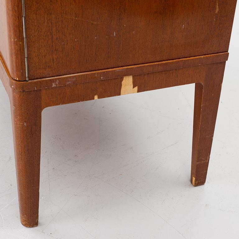 A Swedish Modern cabinet, 1940s.
