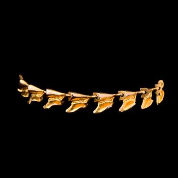 BJÖRN WECKSTRÖM, ARMBAND, "Rullande vågor", 14K guld. Lapponia 1967.