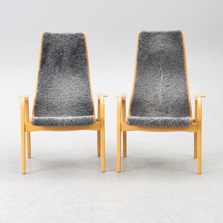 Yngve Ekström, a pair of 'Lamino' easy chairs, Swedese 2004.