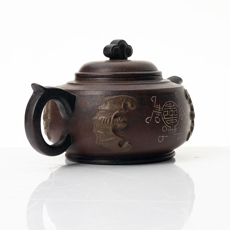 A 'bat' yixing teapot, China 1980s.