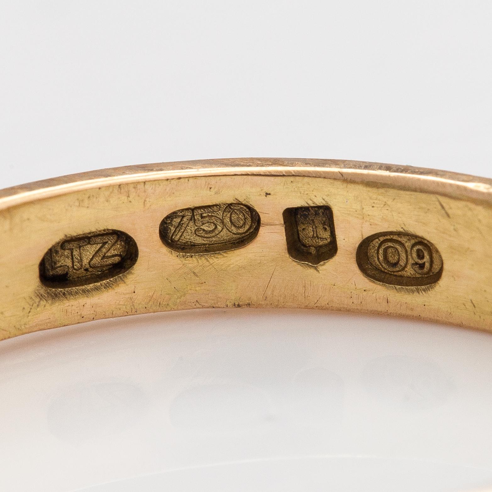 An 18K gold ring with a ruby and diamonds ca. 0.12 ct in total. Lagercrantz Jewellery, Tammisaari 2015.