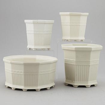 A set of four white glazed "Waldemarsudde" flower pots, Gustavsberg, Sweden, 20th Century.
