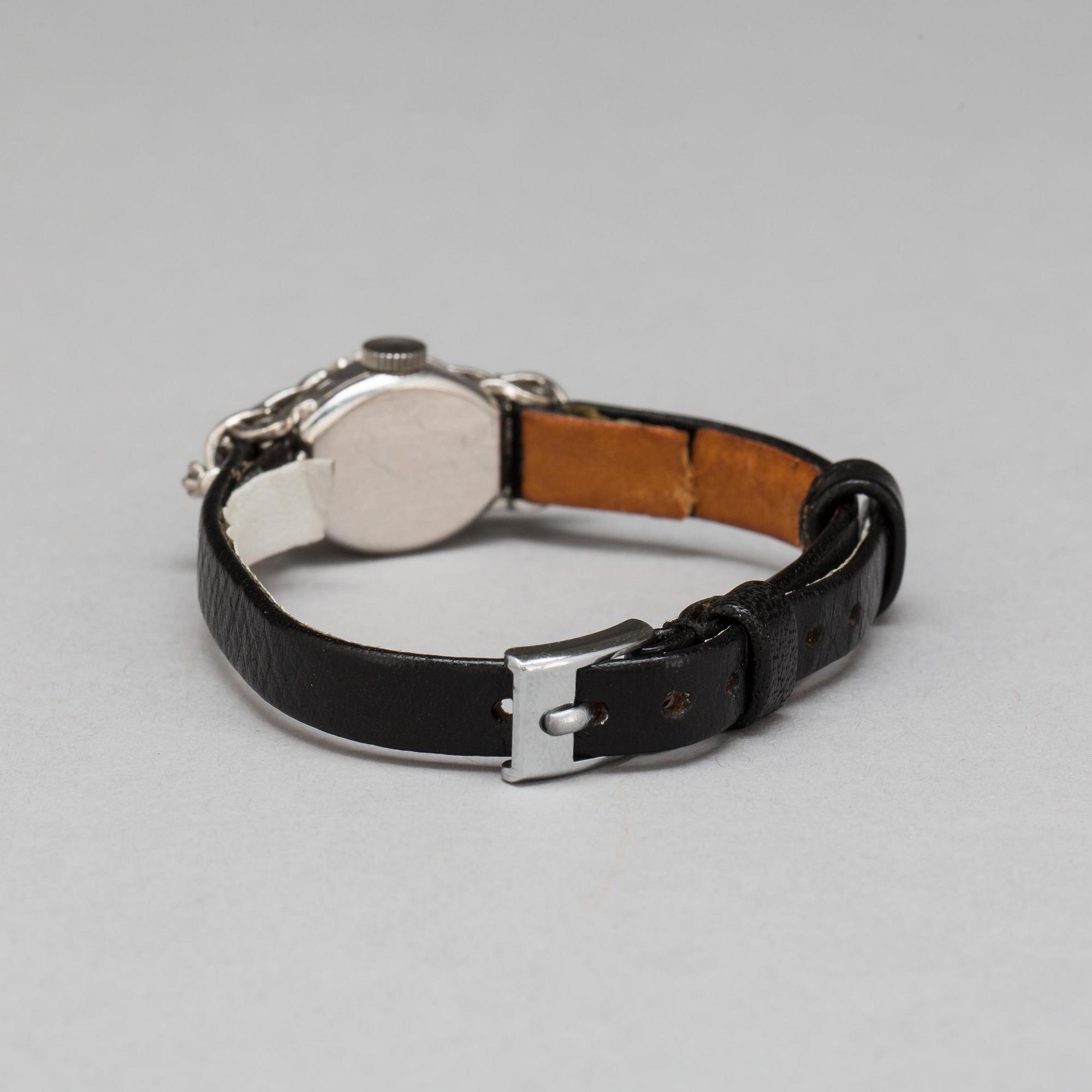 DAMARMBANDSUR, Ebel. Besatt med åttkantslipade diamanter, tot ca 0.60 ct.