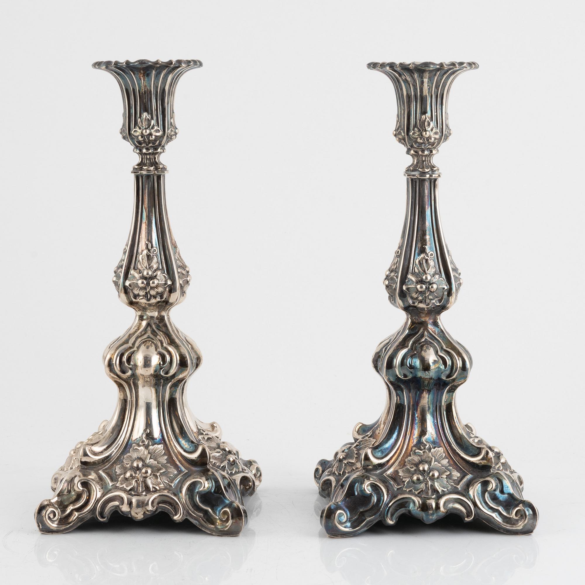 A pair of silver plated candelabra, late 19th Century.