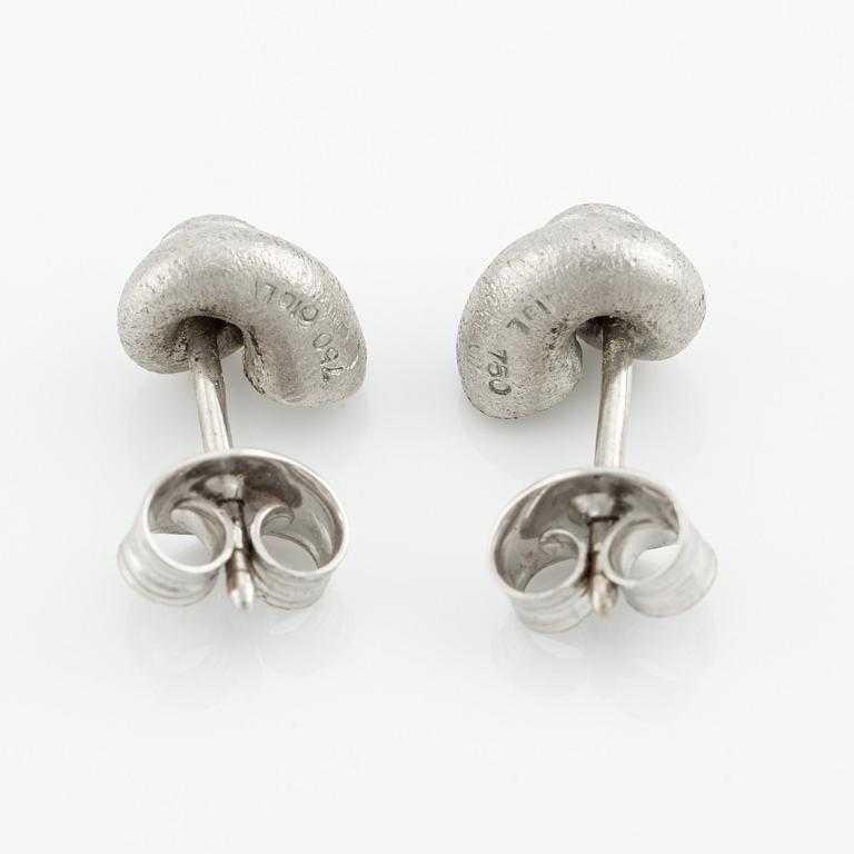 Ole Lynggaard a pair of earrings in the shape of shells.