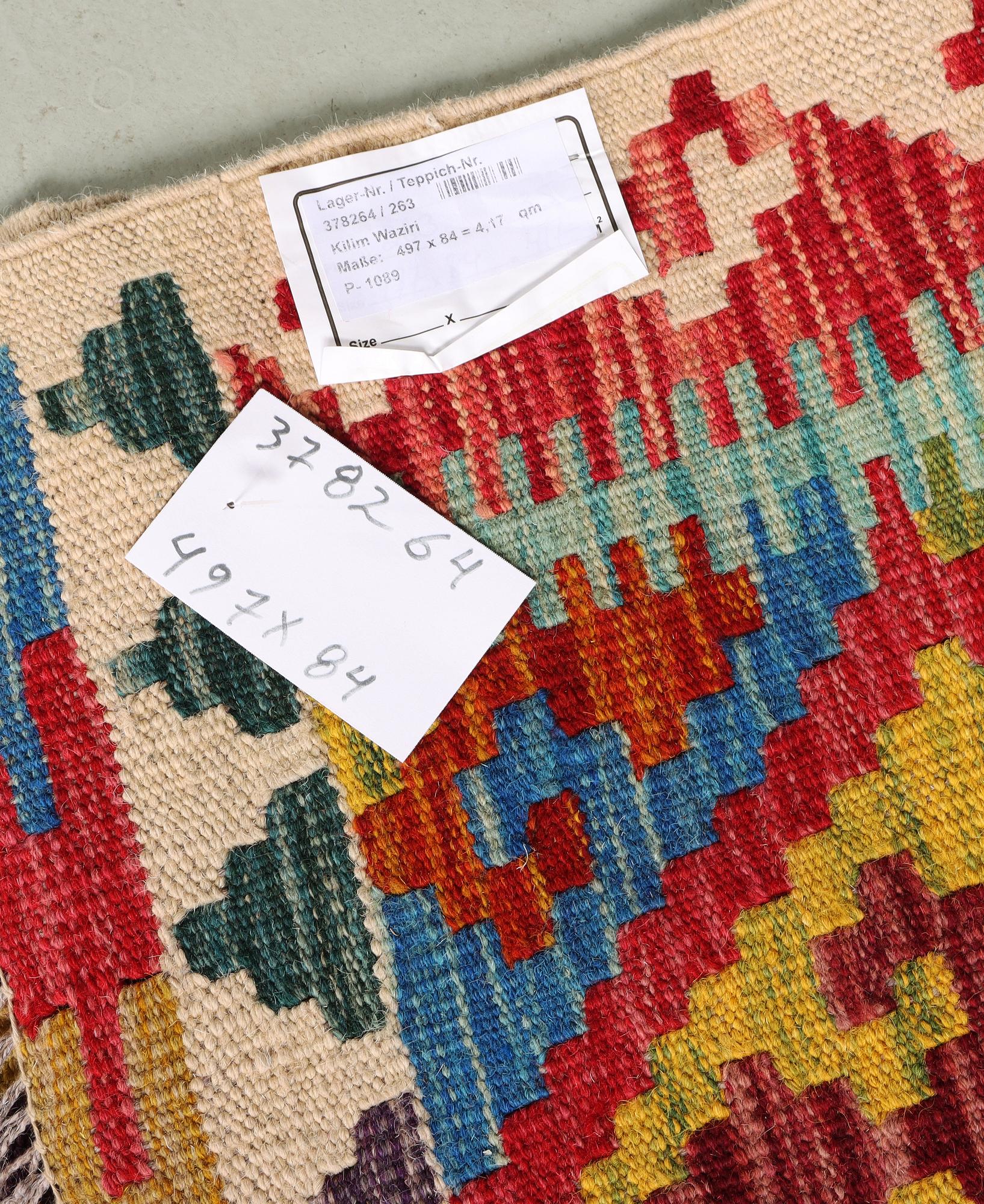 A runner carpet, Kilim, c. 497 x 84 cm.