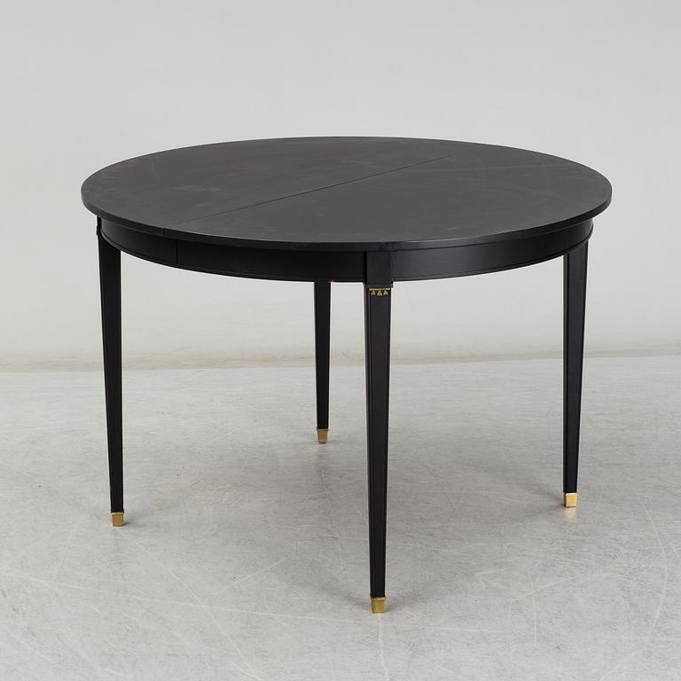 A Gustavian style painted dining table, second half of the 20th century.