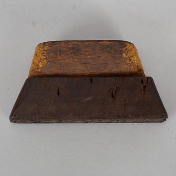 An 18th century wall paper stamp.