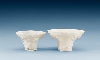 1537. Two blanc de chine rhinoserous shaped libation cups, Qing dynasty, Kangxi (1662-1722).